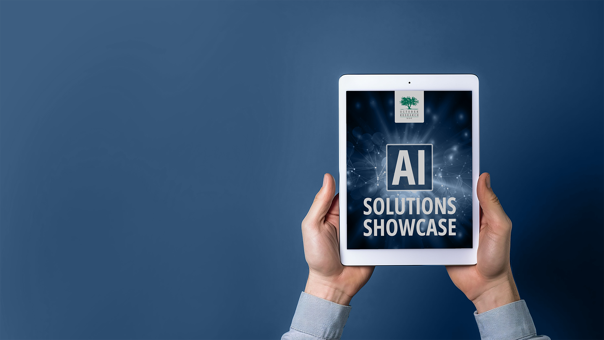 Hands holding a tablet displaying the cover of an "AI Solutions Showcase" report from October Research LLC against a blue background.