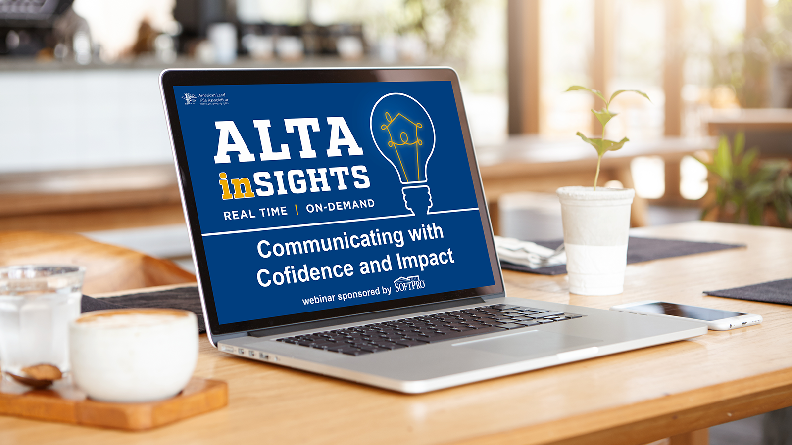 Open laptop on a workspace showing the ALTA inSIGHTS webinar titled “Communicating with Confidence and Impact,” sponsored by SoftPro.