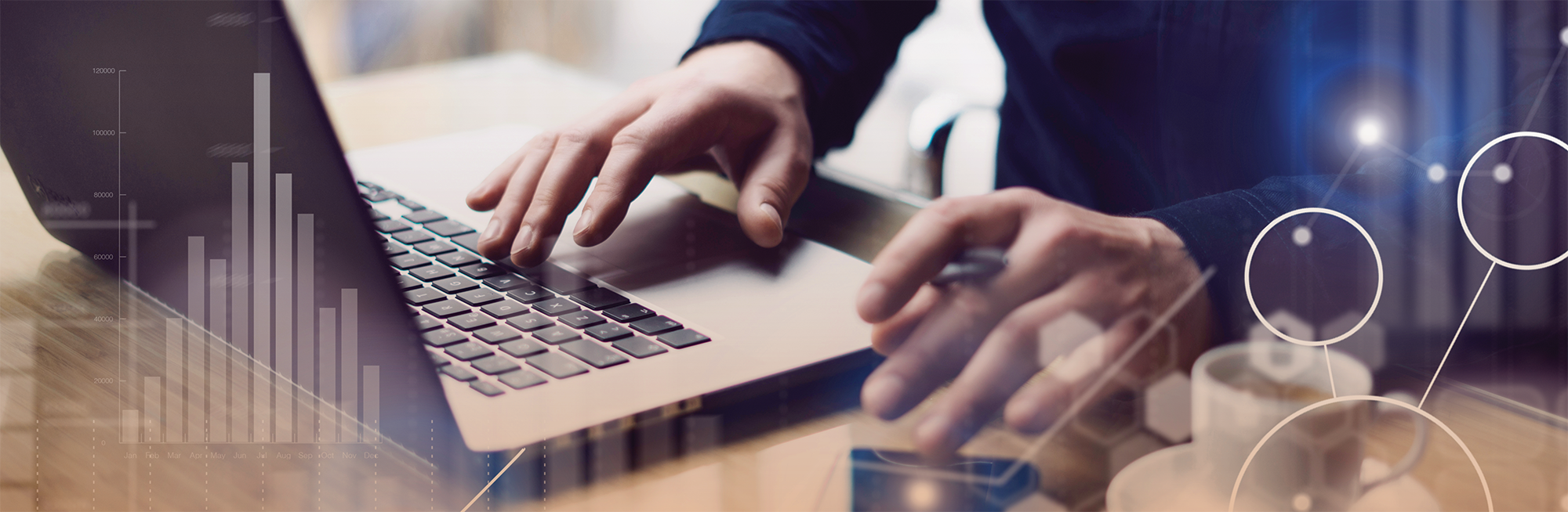 Close-up of a person typing on a laptop while holding a pen, with semi-transparent data visualizations, including bar charts and connected nodes, overlaid on the image